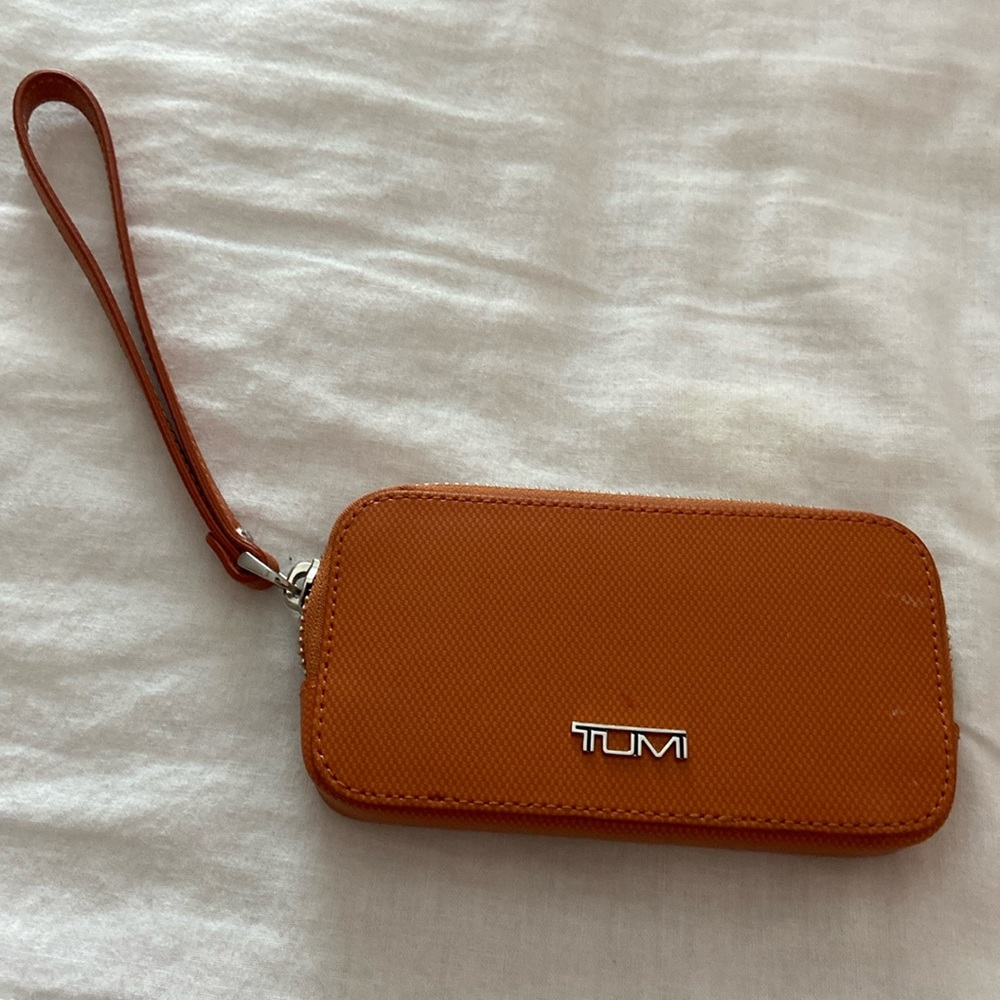 Tumi brunt orange wristlet